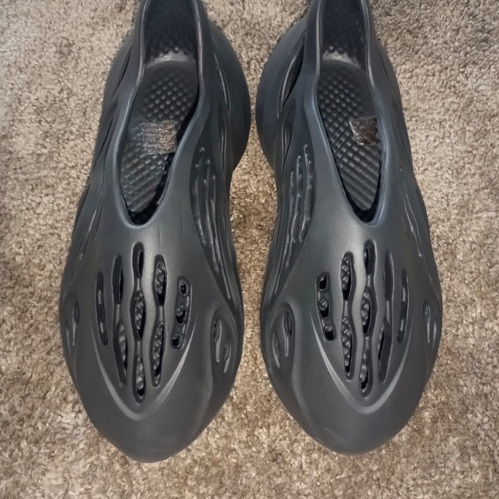 Black Sculptural Sandals with Perforated Design